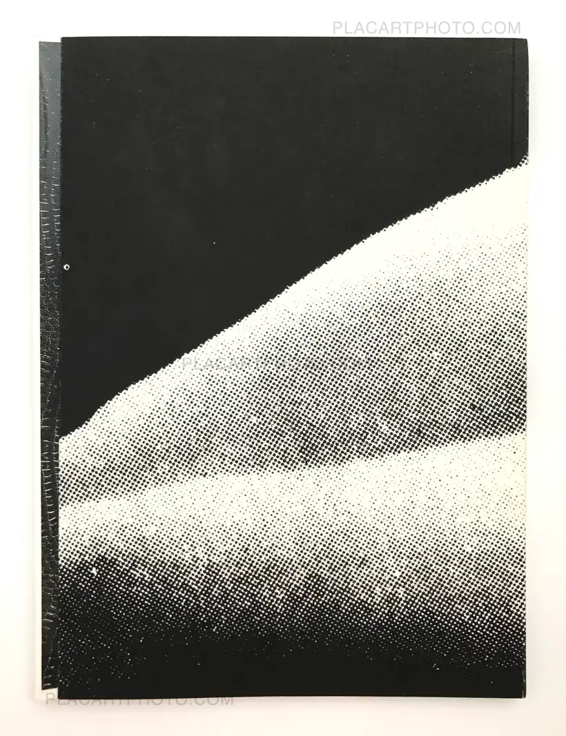 The knife cuts through the apple like a knife cutting an apple (SIGNED)