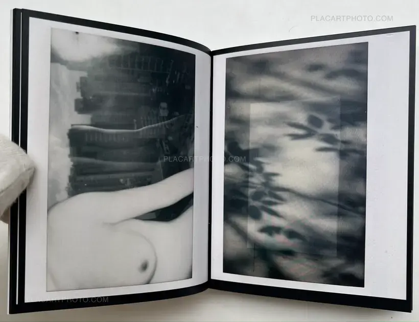 See the polaroid photo attached on the cover (SIGNED)