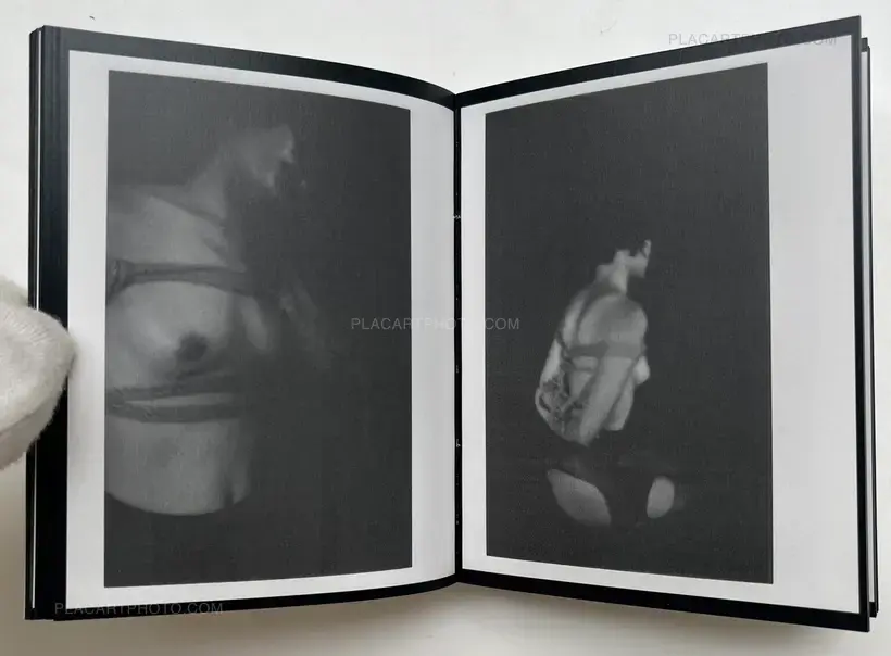 See the polaroid photo attached on the cover (SIGNED)