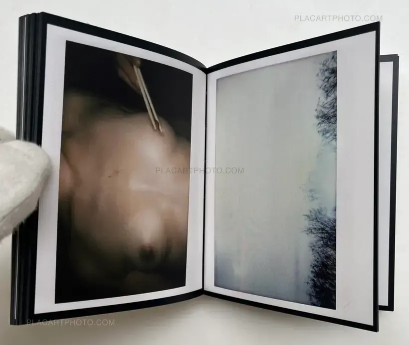 See the polaroid photo attached on the cover (SIGNED)