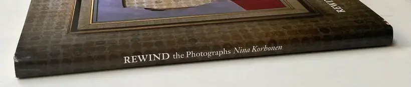 Rewind the photographs (Signed)