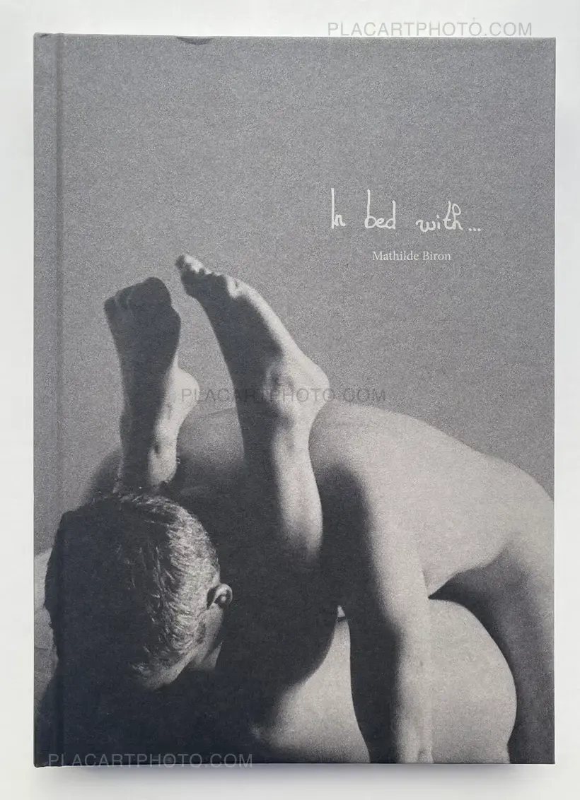 In bed with …(SIGNED)